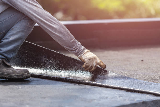 Professional Basement Waterproofing technician working in Economy, IN